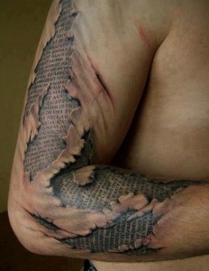 Ancient 3d writing on arm Tat