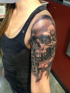 Dead Skull Tattoo on Girl Arm