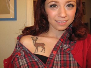 Cute Girl with Deer Tattoo on Shoulder